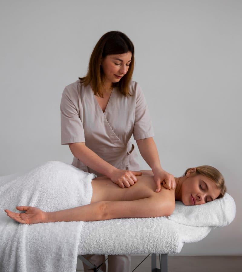 Massage studio, client receiving a massage
